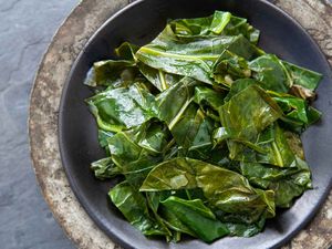 Best ever collard greens cooked on the stovetop and served in a bowl