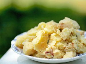 Potato Salad with Apples and Bacon on serving plate