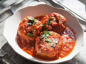 Baked Meatballs in Tomato Sauce served in a bowl