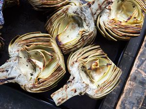 Grilled artichokes on a surface