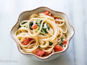 Pasta with fresh garden tomatoes, basil, baby spinach, garlic, and brie