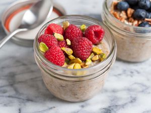 Easy overnight oats in a jar with fruit and nuts on top