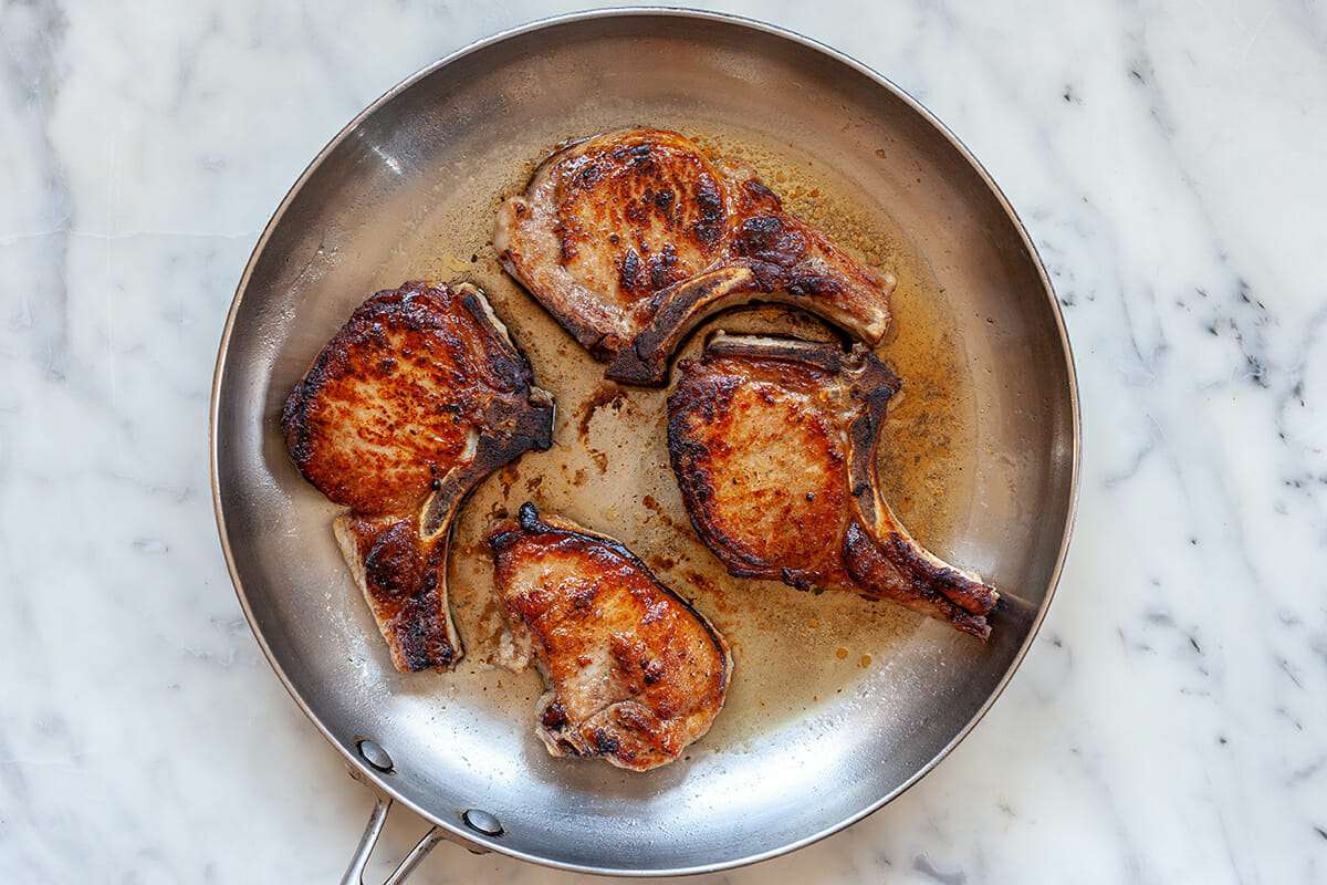 How to Pan Sear Pork Chops cook the chops