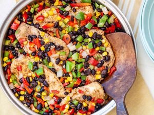 Easy Skillet Chicken - close up of chicken tenders with black beans, corn, and red and green bell peppers