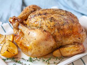 Dry Brined Roast Chicken - - whole chicken on platter Recipe