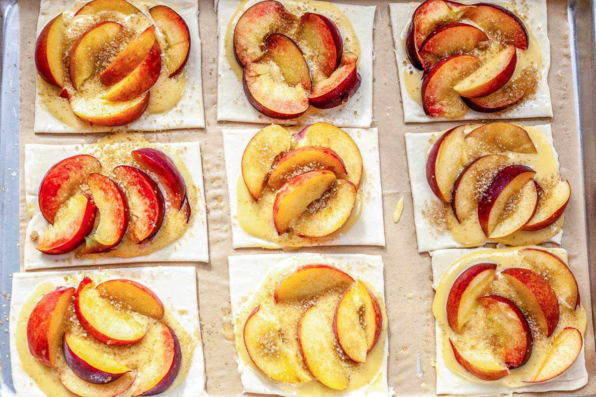 Peach Tart Recipe - peaches on uncooked puff pastry