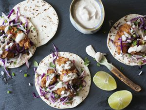 Best Fish Tacos with slaw and crema and lime