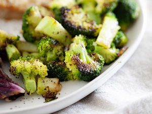 Skillet broccoli with crispy and browned edges on a plate for a side dish.