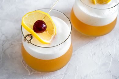 Amaretto Sour Garnished with Lemon Slice and Cherry