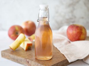 Spiced apple core simple syrup in swing top bottle