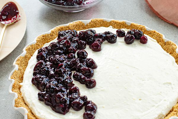 Whole Blueberry Ice Box pie with blueberries on the top.