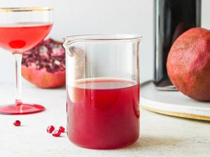 Grenadine in a glass cocktail mixer.