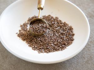 Caraway seeds in a white dish