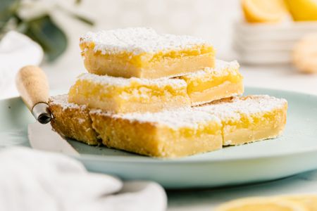 Stacked Lemon Bars on a Plate
