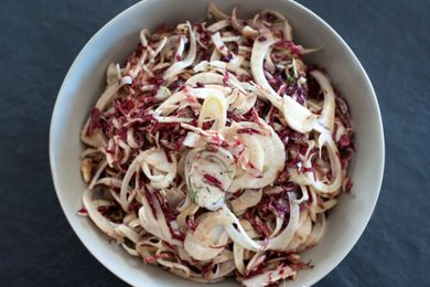 Quick and easy slaw in a white serving bowl.