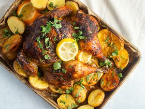 Roasted Spatchcock Chicken with Harissa, Herb Yogurt, and Citrus